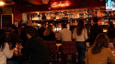 People gathered in the cocktail bar area at Gilbert & Wright, Malahide