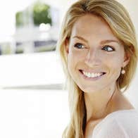 Festival of Voice: Laurence Servaes Song Recital, headshot of smiling woman against blurry white background.