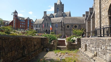 Looking at Christchurch Cathedral with flags