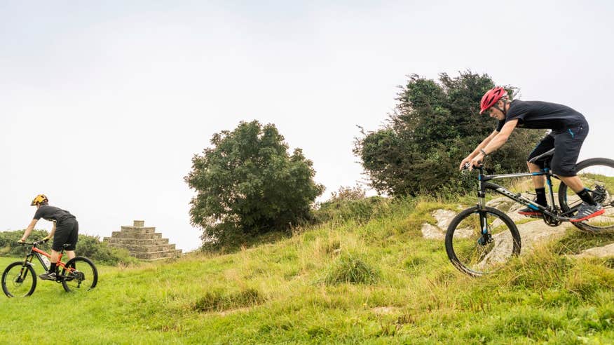 Two people mountain biking, County Dublin