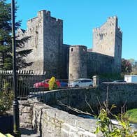 Cahir Castle viewed from a stone bridge in Cahir County Tipperary
