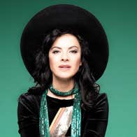Camille O'Sullivan: Loveletter - A lady in a large black hat.