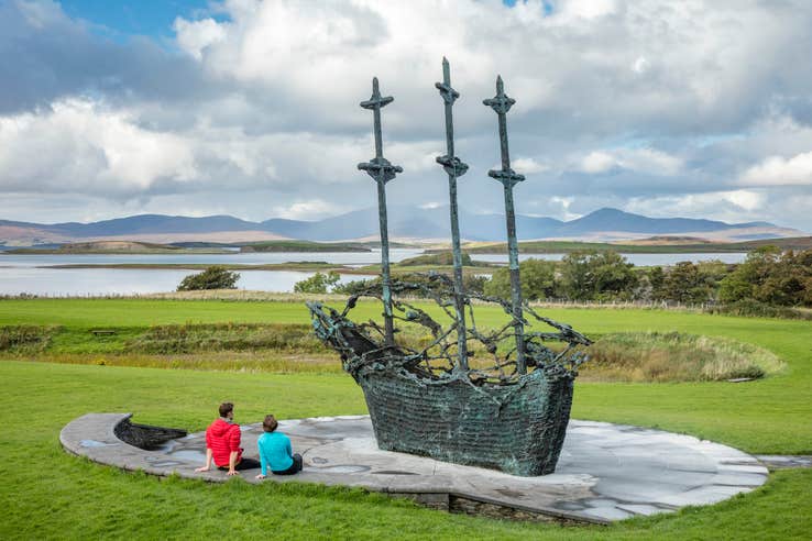 People viewing the National Famine Memorial in Murrisk, Co Mayo