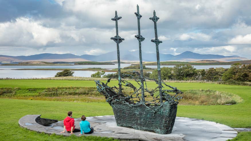 People viewing the National Famine Memorial in Murrisk, Co Mayo
