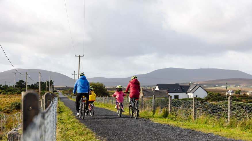 Finish up your cycle on Acaill and take in the peaks of Slievemore and Croaghaun.