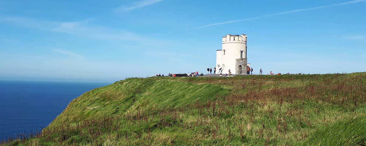 Visitors at O Briens Tower on a bright day with blue skies