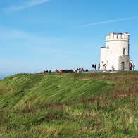 Visitors at O Briens Tower on a bright day with blue skies