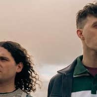 2 men looking into the distance