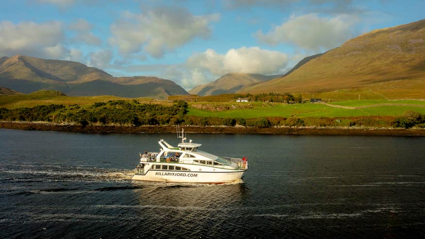 A boat tour cruising down the Killary Fjord in Co Galway