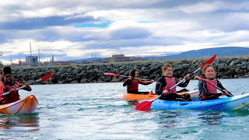 Image of people kayaking in harbour at Dun Laoghaire