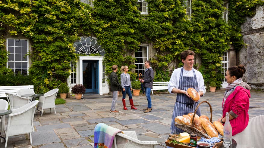 People standing outside Ballymaloe House in Cork