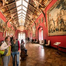 Friends looking at art inside Kilkenny Castle, Kilkenny City, County Kilkenny