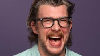 Comedian Tony Cantwell with You Cry Weird Tour, a man laughing out loud.