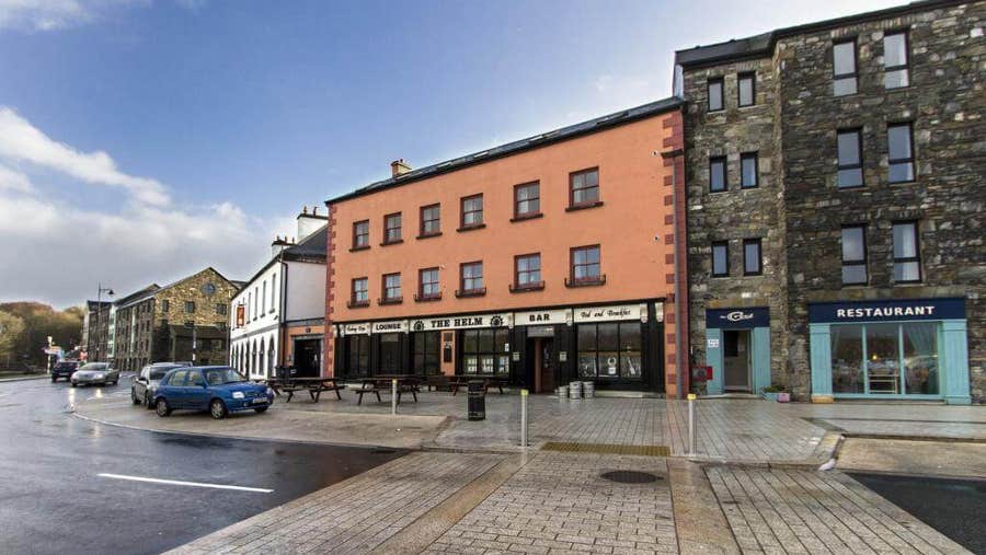 Outside street view of the Helm Bar and Restaurant