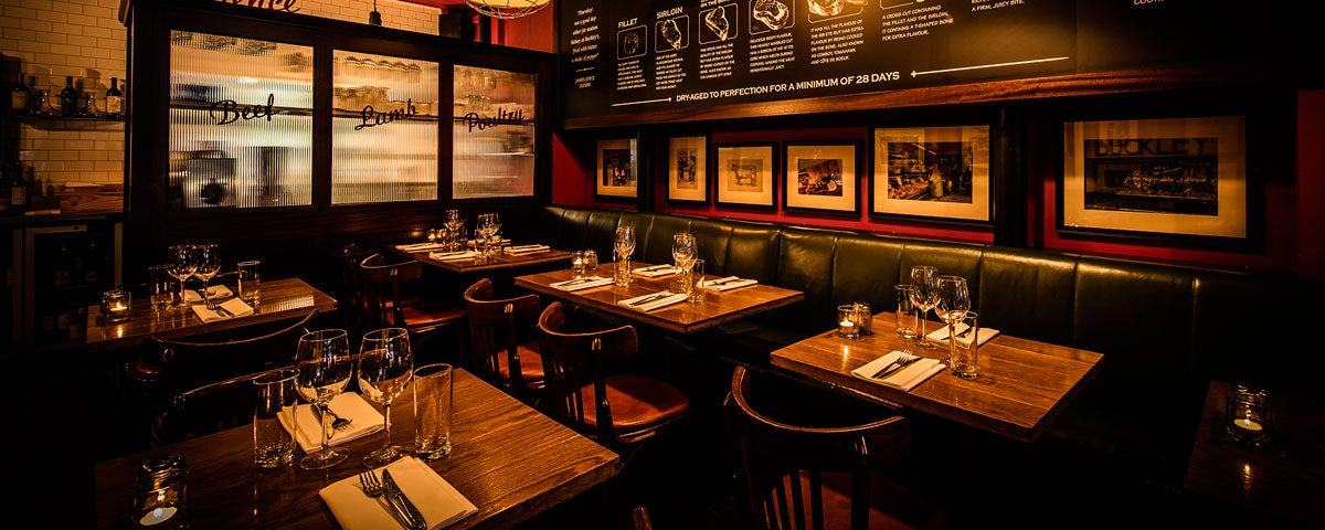 Dimly lit interior of FX Buckley Crow Street restaurant