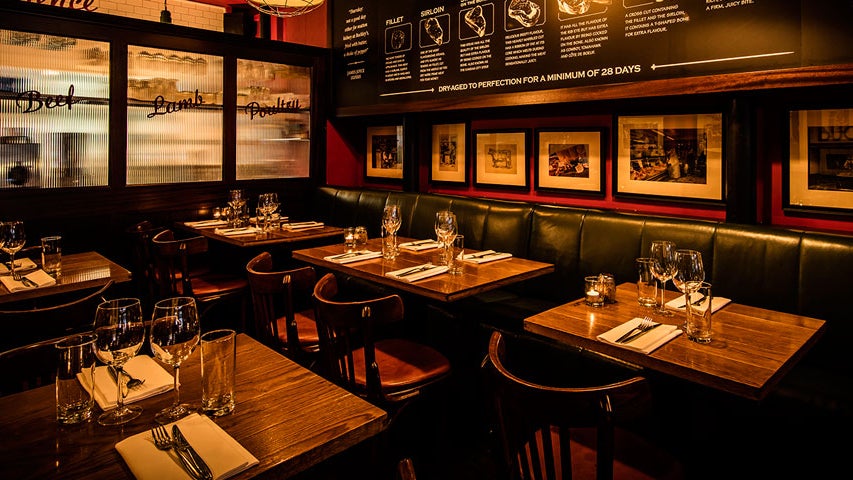 Dimly lit interior of FX Buckley Crow Street restaurant