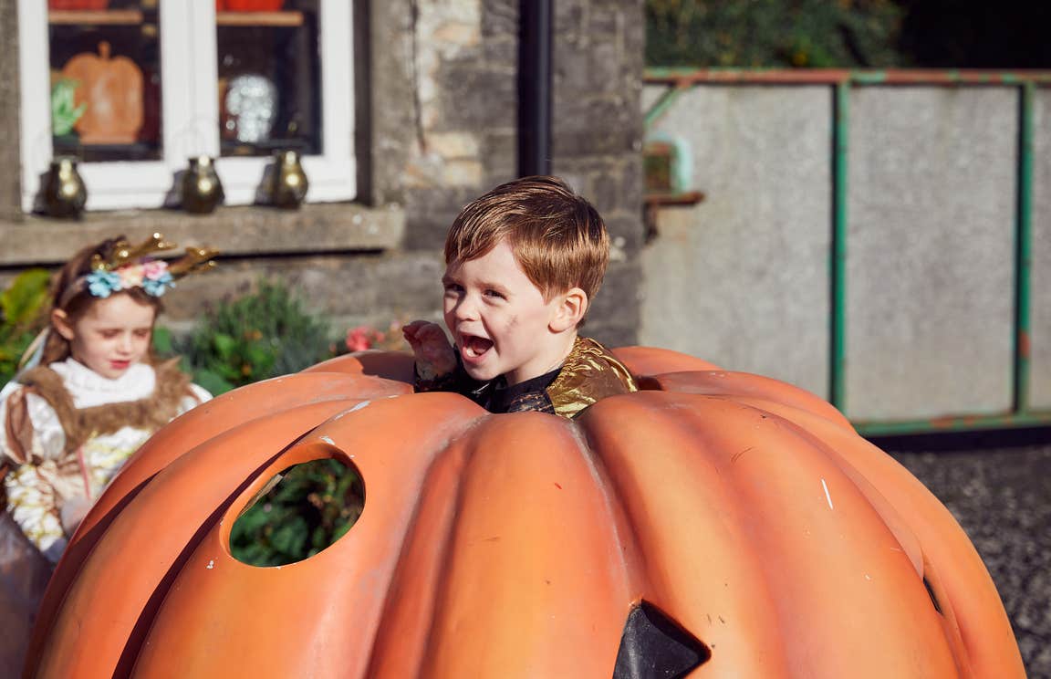 A boy and girl at Causey Farm in County Meath during Halloween.