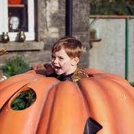 A boy and girl at Causey Farm in County Meath during Halloween.