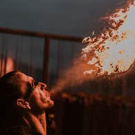 Samhain After Dark Belvedere, a man appearing to blow fire out of his mouth