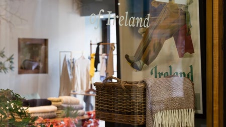 A branded window display of the Stable shop front