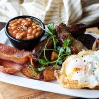 A full Irish breakfast on a white platter