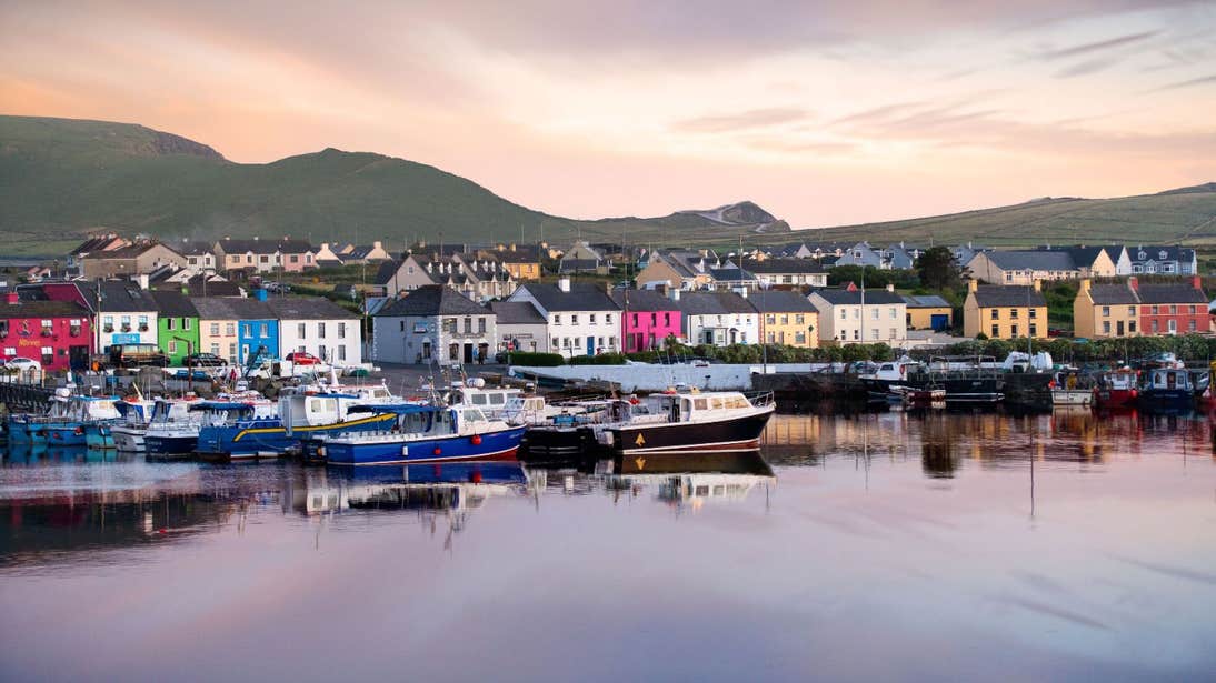 Boats in front of colourful buildings in Portmagee, Co. Kerry