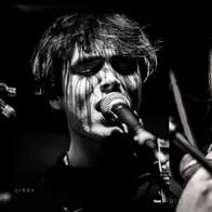 Singers with microphones.