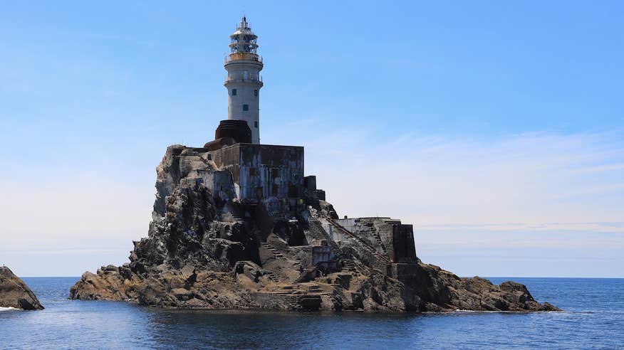 Image of Fastnet Lighthouse county Cork, on a clear day with bright blue skies.