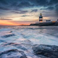 Image of Hook Head lighthouse at sunset, County Wexford