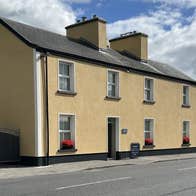 Exterior image of Father Flanagan Visitor Centre with a sign outside