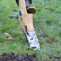Demonstration of the old tradition of turning the sod with the Loy from Loy Association of Ireland, on Potato day.