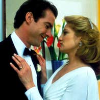 A man and a woman staring lovingly into each other's eyes.