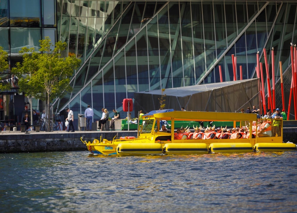 A passenger boat moored at a pier