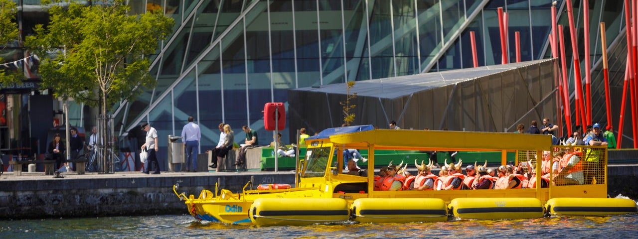 A passenger boat moored at a pier