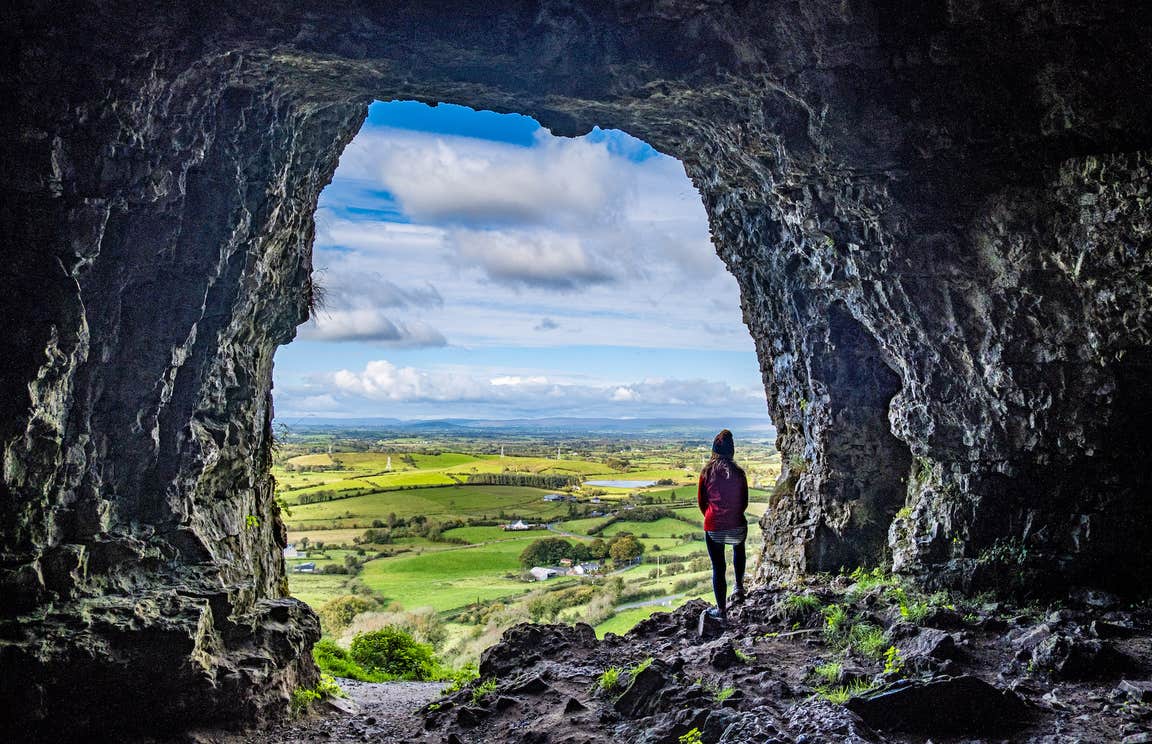 A woman in the Caves of Keash in County Sligo