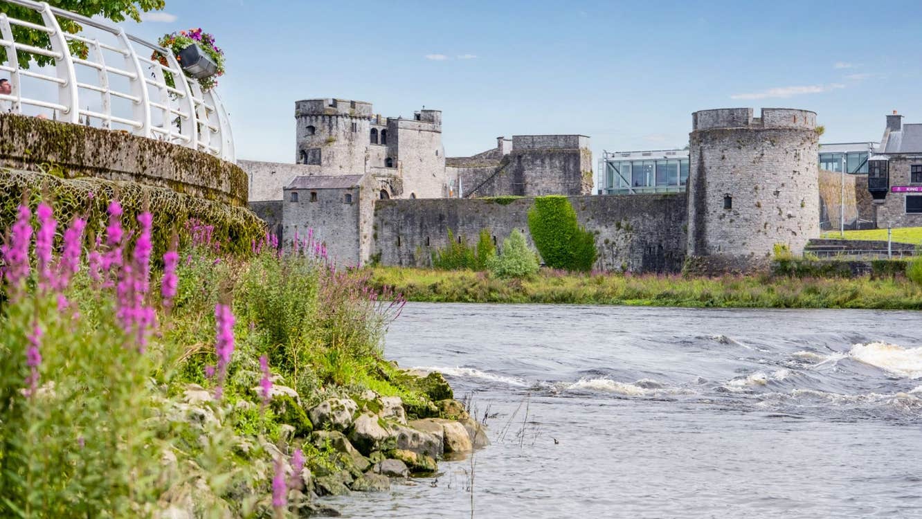 A view of a castle from the river