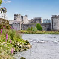 A view of a castle from the river