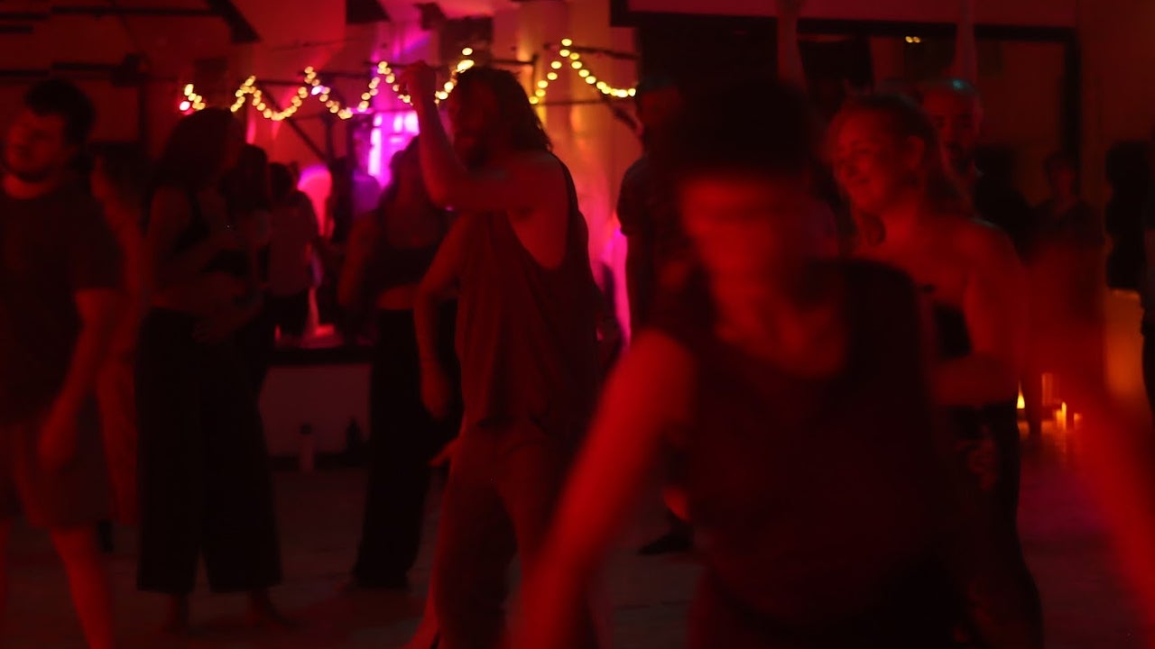 People dancing at an ecstatic dance in Dublin