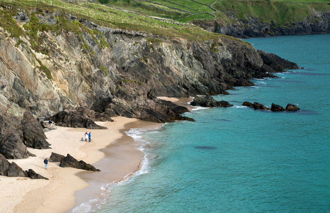 People on the golden sands of the Blasket Islands
