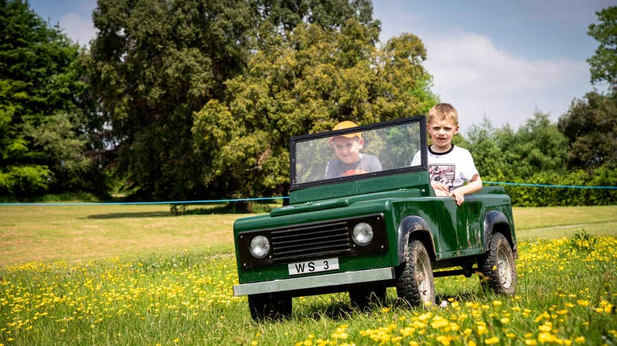 Children in a Toy Car at Lough Key Forest & Activity Park, Boyle, Co Roscommon