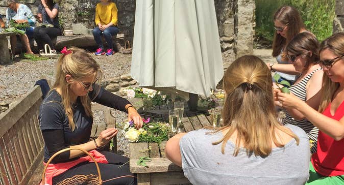 Blackstairs Eco Trails group of women making floral crowns