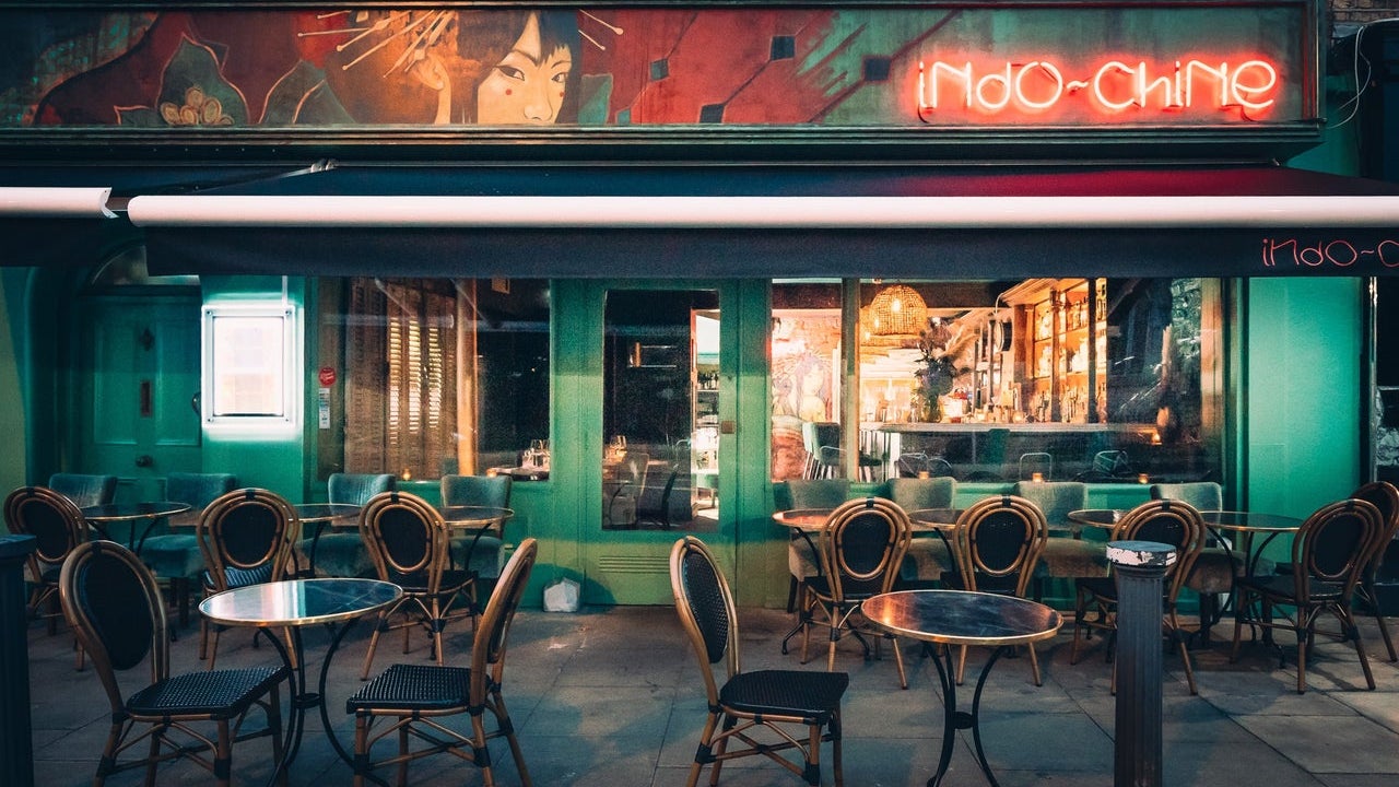 Exterior of a restaurant with an outside seating area