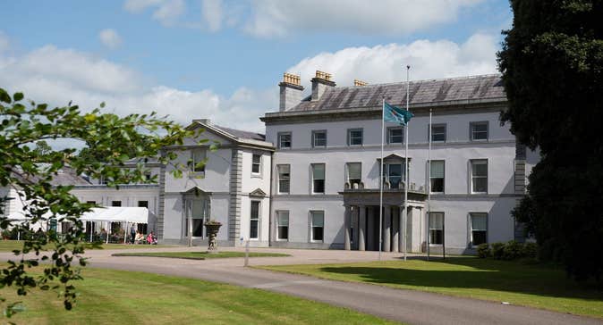 A large period house overlooking a well maintained lawn
