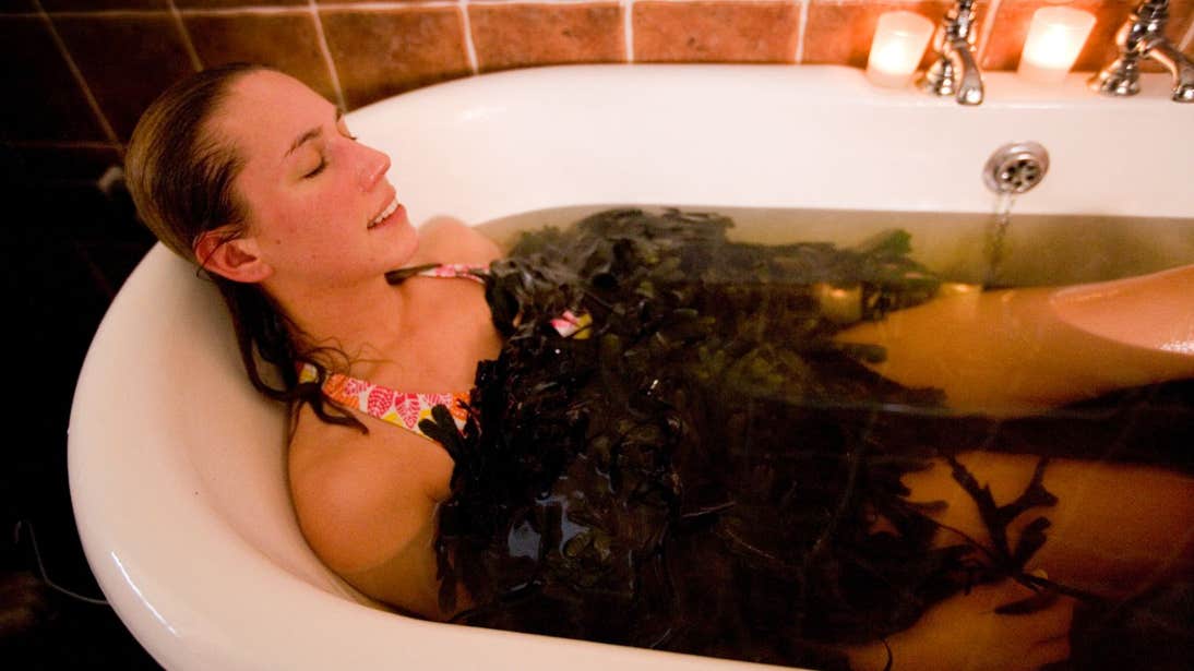 Woman relaxing in a Voya Seaweed Bath, Strandhill, Sligo