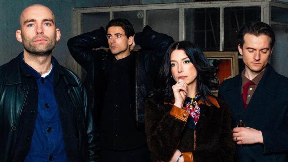 Group of 3 men and a woman all looking thoughtful in different directions