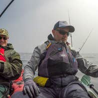 Two men out fishing with Angling Adventures West Cork