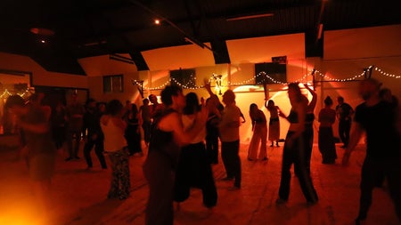 People dancing at an ecstatic dance in Dublin