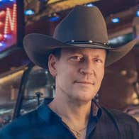 Robert Mizzell Dance - Gleneagle Arena, a gently smiling man in a brown cowboy style hat.