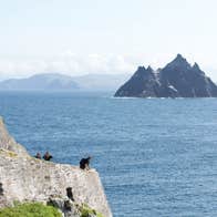 Skellig Michael viewed from a coastal path along Ireland's Atlantic shoreline